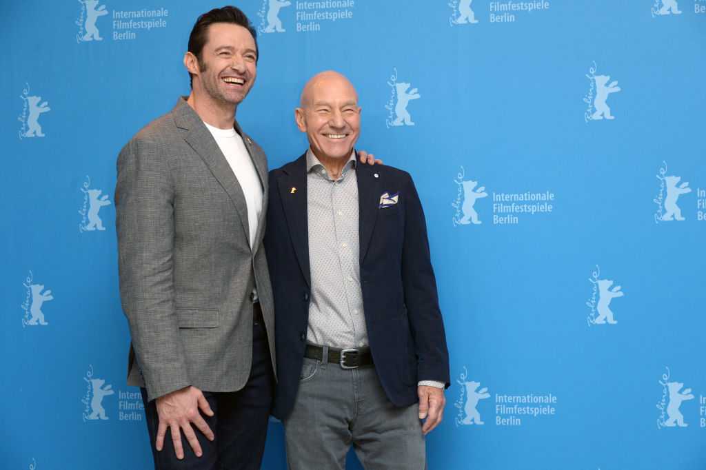 Hugh Jackman and Patrick Stewart at a movie premiere
